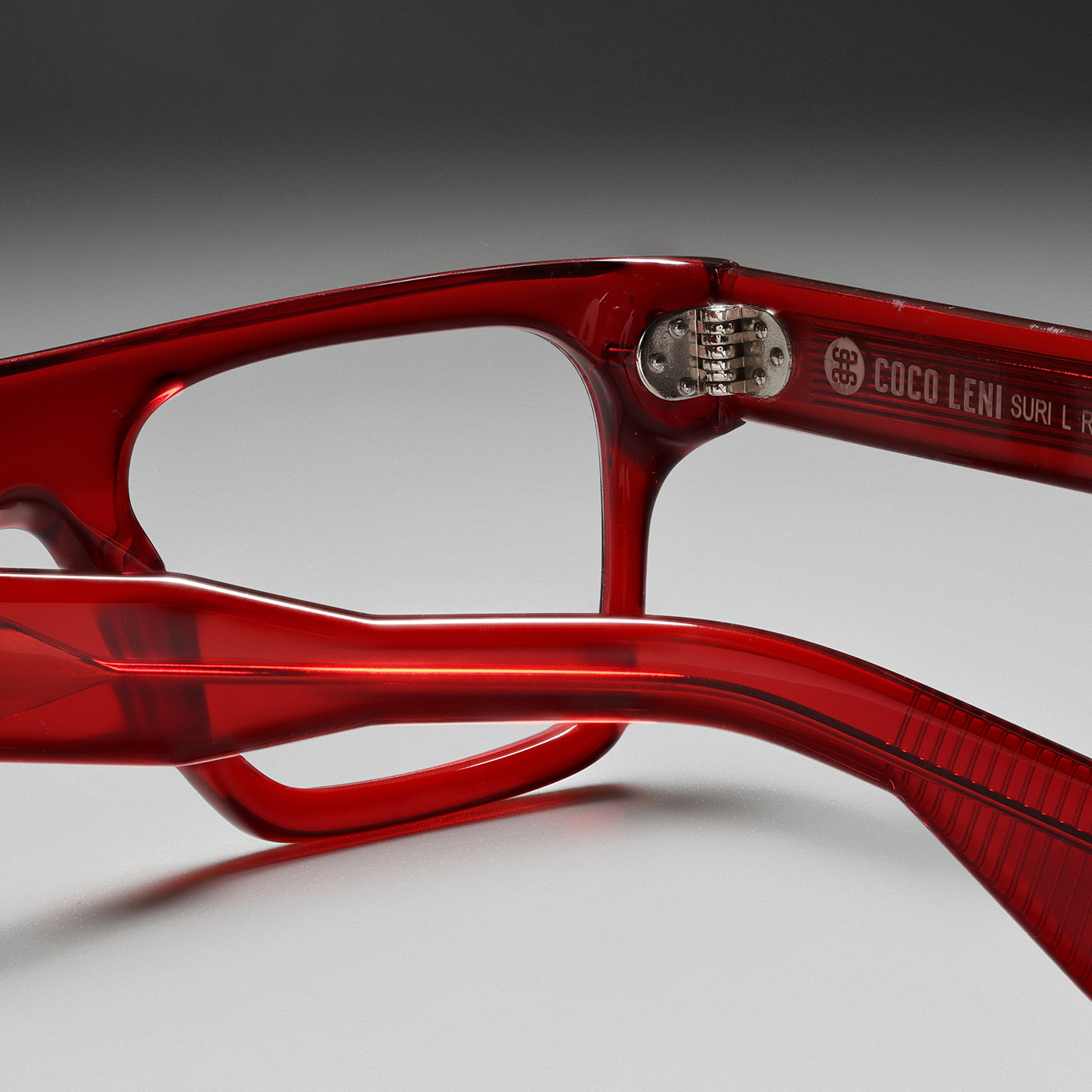 Suri Red SG